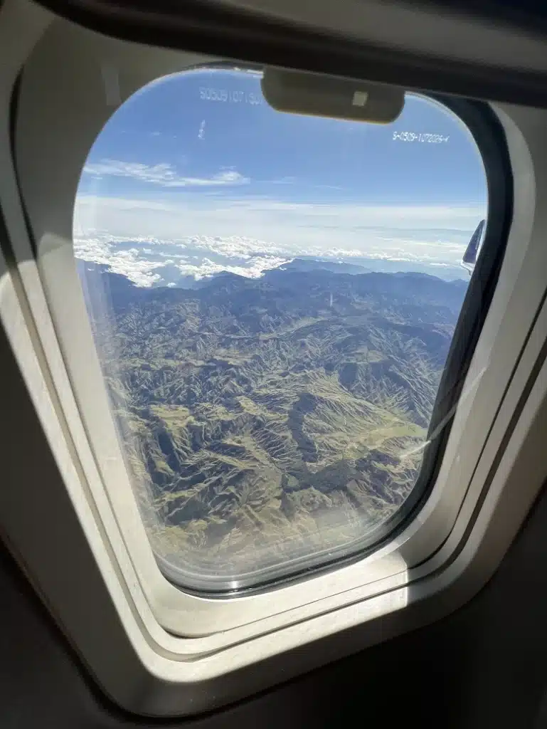 Plane window over Bogotá, Colombia