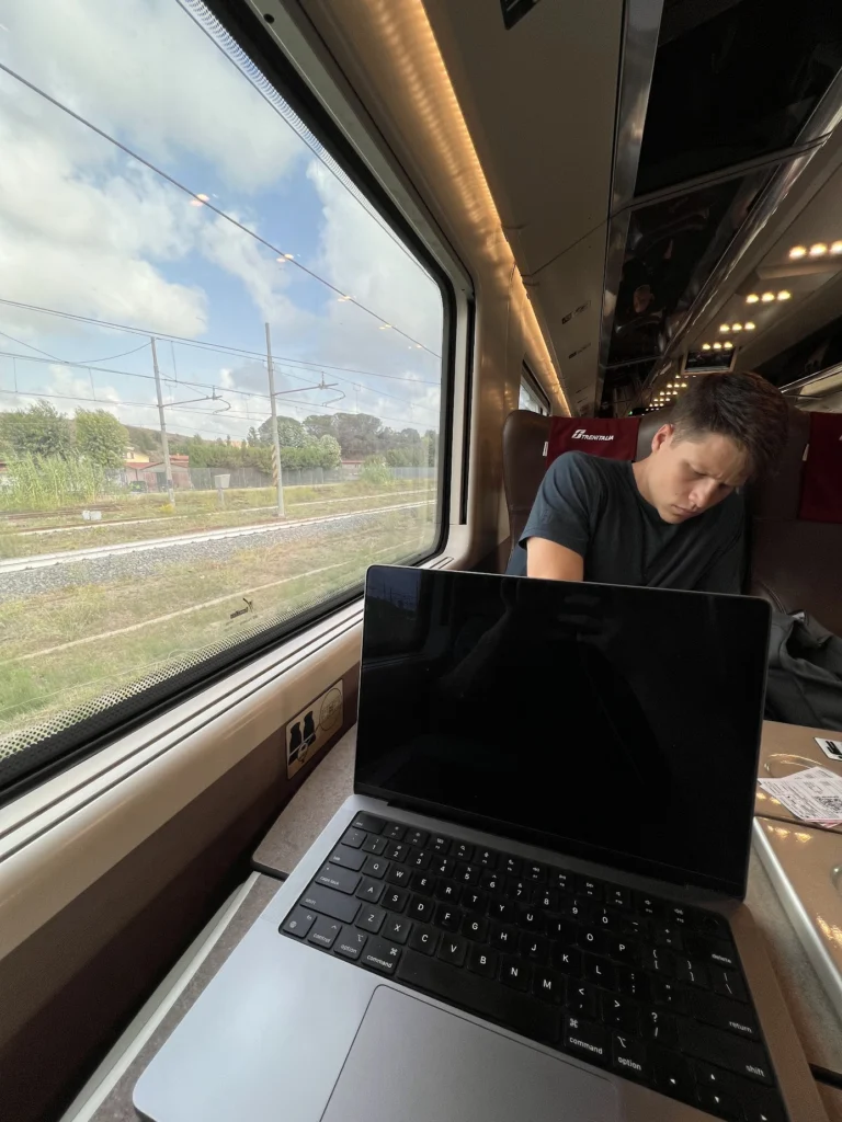 My brother and I en route to Rome, Italy, by train